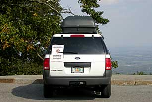 Vehicle with Blue Ridge Parkway biological survey sign used while ground truthing vegetation mapping project.