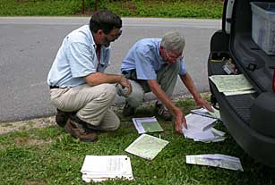 Tom Govus, Nature Serve, and Rick Seavey discussing plant communities beside Blue Ridge Parkway.