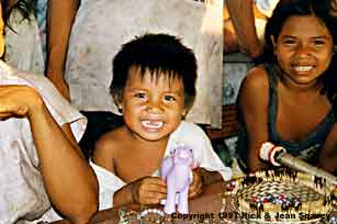 Yagua indian little boy with big beautiful smile.